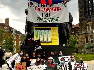 Members and supporters of SJP at University of Illinois, Urbana-Champaign demonstrate their support for a Free Palestine