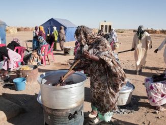 Sudan displaced women cooking in North Kordofan